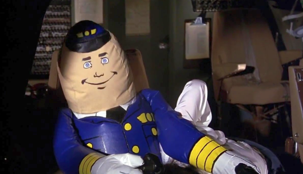 This is an image of the "autopilot" blow-up doll from the movie Airplane.