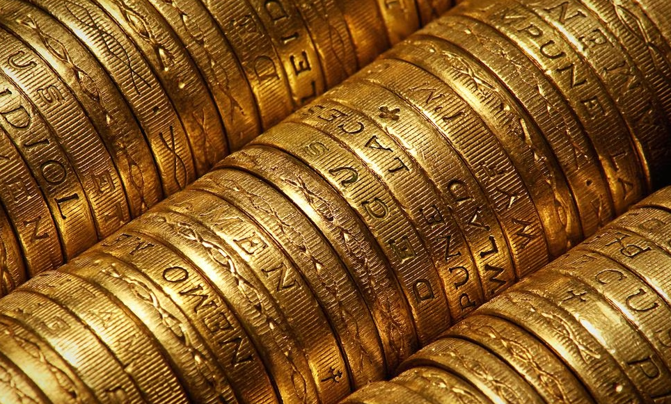 This is an image of rolls of antique gold coins.